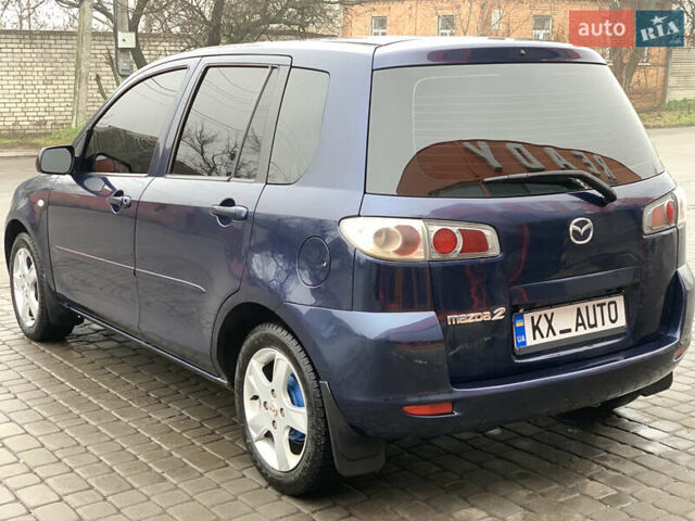 Синий Мазда 2, объемом двигателя 1.4 л и пробегом 185 тыс. км за 5700 $, фото 18 на Automoto.ua
