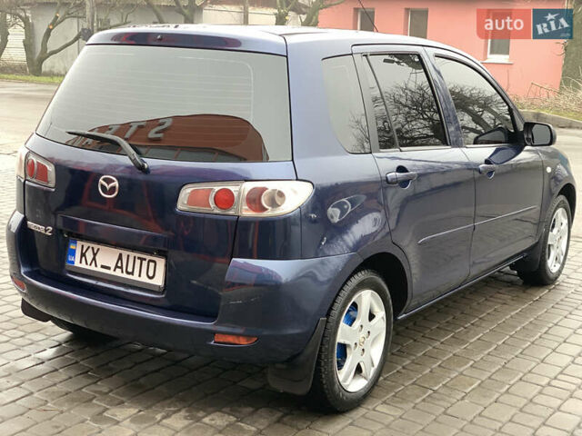 Синий Мазда 2, объемом двигателя 1.4 л и пробегом 185 тыс. км за 5700 $, фото 19 на Automoto.ua