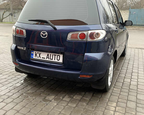 Синий Мазда 2, объемом двигателя 1.4 л и пробегом 185 тыс. км за 5700 $, фото 20 на Automoto.ua