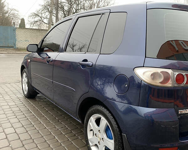 Синий Мазда 2, объемом двигателя 1.4 л и пробегом 185 тыс. км за 5700 $, фото 23 на Automoto.ua