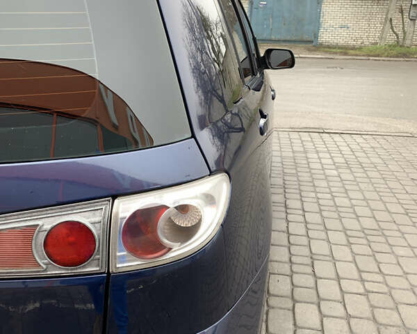 Синий Мазда 2, объемом двигателя 1.4 л и пробегом 185 тыс. км за 5700 $, фото 21 на Automoto.ua