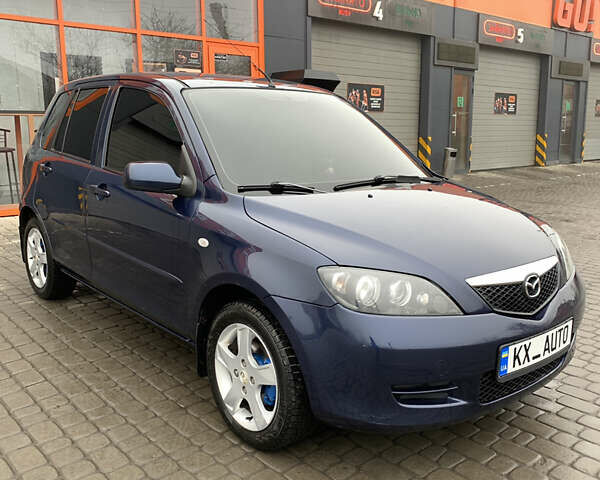 Синий Мазда 2, объемом двигателя 1.4 л и пробегом 185 тыс. км за 5700 $, фото 27 на Automoto.ua