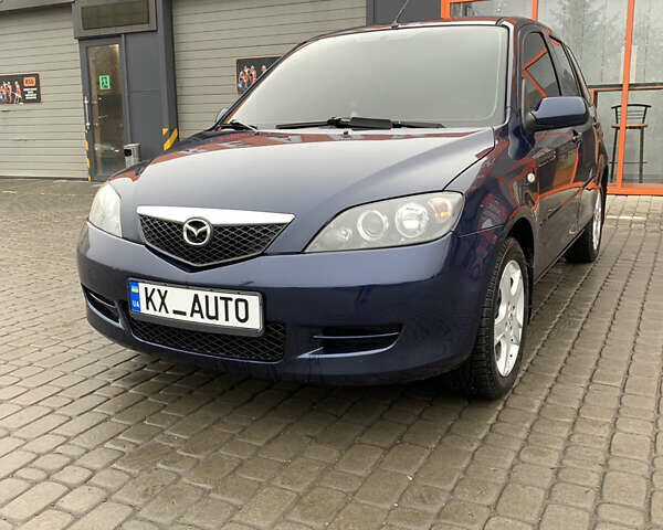 Синий Мазда 2, объемом двигателя 1.4 л и пробегом 185 тыс. км за 5700 $, фото 8 на Automoto.ua