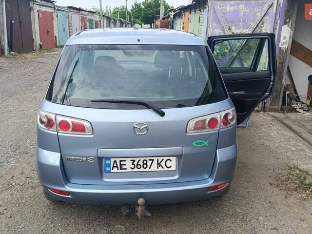 Синій Мазда 2, об'ємом двигуна 1.39 л та пробігом 295 тис. км за 4300 $, фото 1 на Automoto.ua