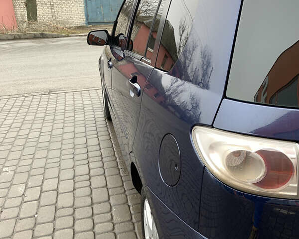 Синий Мазда 2, объемом двигателя 1.4 л и пробегом 185 тыс. км за 5700 $, фото 22 на Automoto.ua