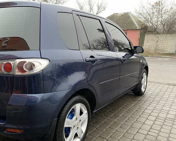 Синий Мазда 2, объемом двигателя 1.4 л и пробегом 185 тыс. км за 5700 $, фото 26 на Automoto.ua