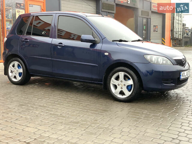 Синий Мазда 2, объемом двигателя 1.4 л и пробегом 185 тыс. км за 5700 $, фото 9 на Automoto.ua