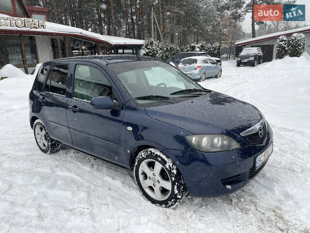 Синій Мазда 2, об'ємом двигуна 1.4 л та пробігом 178 тис. км за 3999 $, фото 3 на Automoto.ua