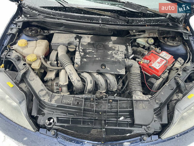 Синій Мазда 2, об'ємом двигуна 1.4 л та пробігом 178 тис. км за 3999 $, фото 46 на Automoto.ua