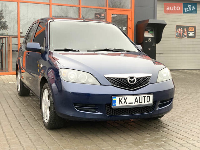 Синий Мазда 2, объемом двигателя 1.4 л и пробегом 185 тыс. км за 5700 $, фото 11 на Automoto.ua