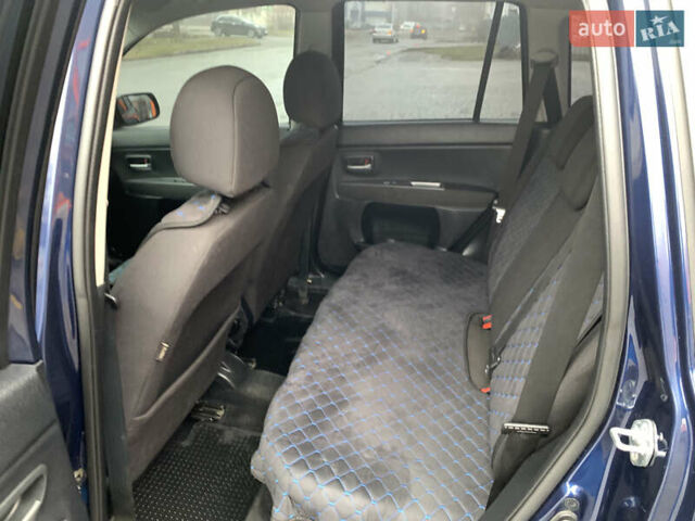 Синий Мазда 2, объемом двигателя 1.4 л и пробегом 185 тыс. км за 5700 $, фото 12 на Automoto.ua