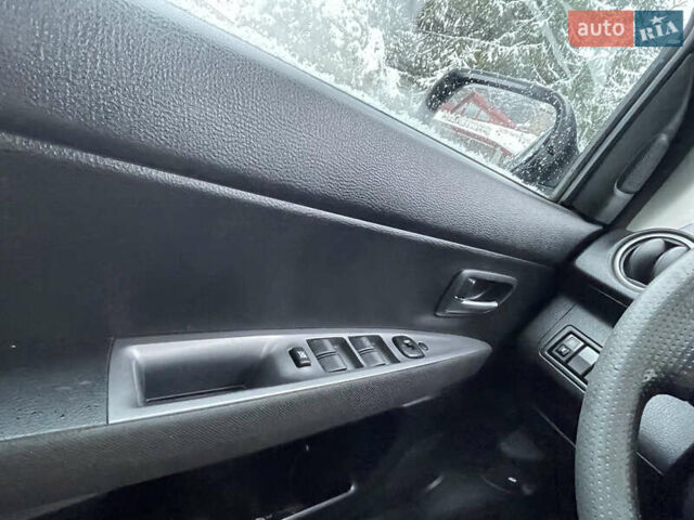 Синій Мазда 2, об'ємом двигуна 1.4 л та пробігом 178 тис. км за 3999 $, фото 43 на Automoto.ua