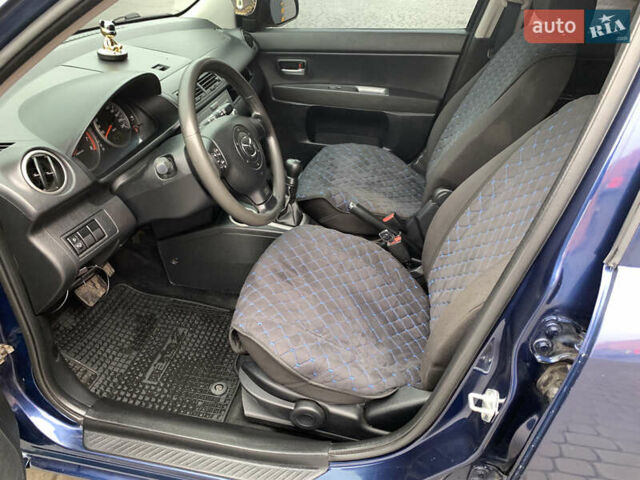 Синий Мазда 2, объемом двигателя 1.4 л и пробегом 185 тыс. км за 5700 $, фото 17 на Automoto.ua
