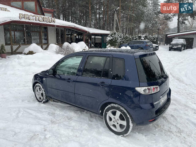 Синій Мазда 2, об'ємом двигуна 1.4 л та пробігом 178 тис. км за 3999 $, фото 13 на Automoto.ua