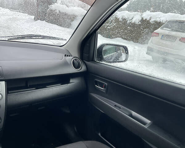 Синій Мазда 2, об'ємом двигуна 1.4 л та пробігом 178 тис. км за 3999 $, фото 30 на Automoto.ua