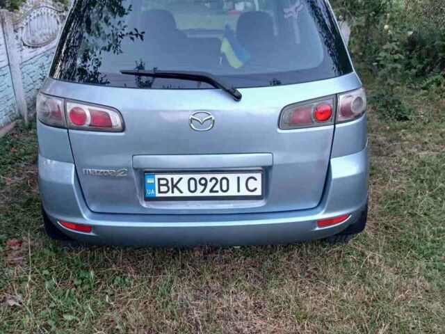Синій Мазда 2, об'ємом двигуна 1.24 л та пробігом 189 тис. км за 3500 $, фото 4 на Automoto.ua