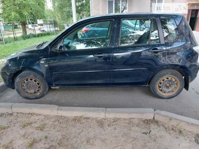 Синій Мазда 2, об'ємом двигуна 1.25 л та пробігом 257 тис. км за 3500 $, фото 2 на Automoto.ua