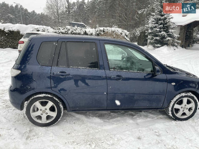 Синій Мазда 2, об'ємом двигуна 1.4 л та пробігом 178 тис. км за 3999 $, фото 21 на Automoto.ua