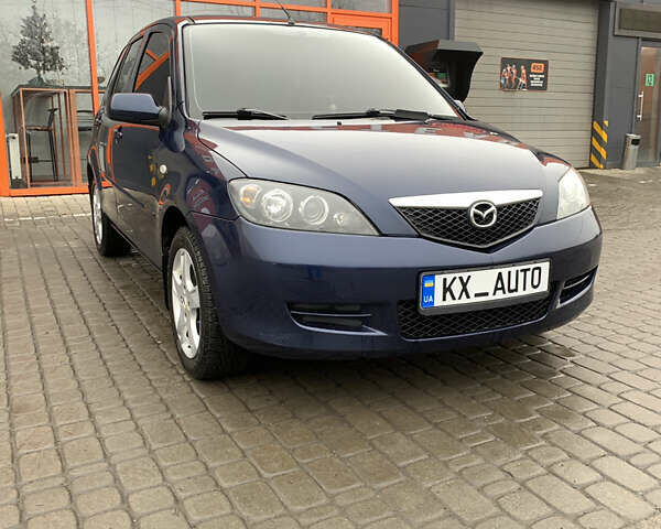 Синий Мазда 2, объемом двигателя 1.4 л и пробегом 185 тыс. км за 5700 $, фото 3 на Automoto.ua