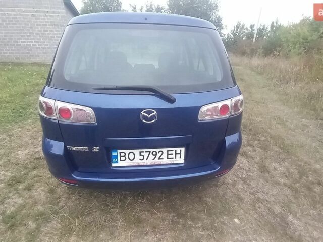 Синій Мазда 2, об'ємом двигуна 1.39 л та пробігом 144 тис. км за 3800 $, фото 2 на Automoto.ua