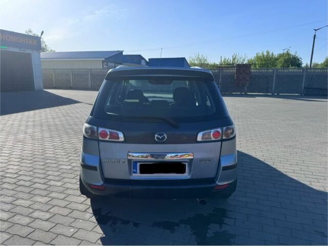 Синий Мазда 2, объемом двигателя 1.4 л и пробегом 135 тыс. км за 1899 $, фото 5 на Automoto.ua