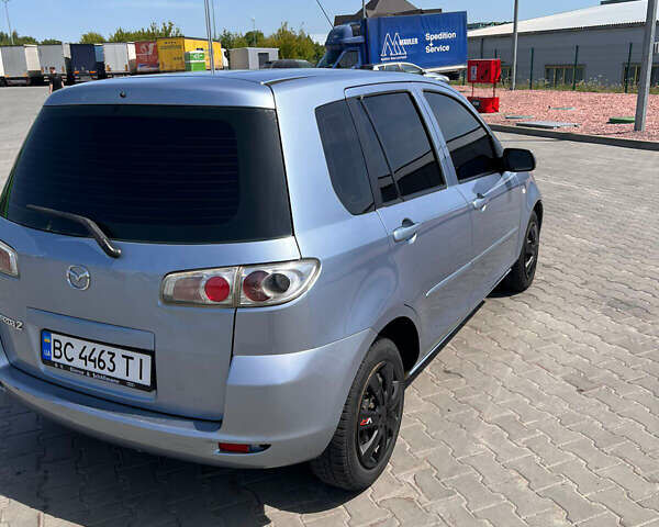 Синий Мазда 2, объемом двигателя 1.4 л и пробегом 179 тыс. км за 3499 $, фото 5 на Automoto.ua