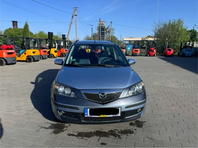 Синий Мазда 2, объемом двигателя 1.4 л и пробегом 135 тыс. км за 1899 $, фото 1 на Automoto.ua