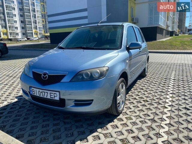 Синий Мазда 2, объемом двигателя 1.39 л и пробегом 272 тыс. км за 4100 $, фото 4 на Automoto.ua