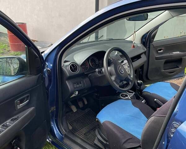 Мазда 2 2007 в Славуте на Automoto.ua Синий Мазда 2, объемом двигателя 1.4 л и пробегом 204 тыс. км за 4200 $, фото 5 на Automoto.ua