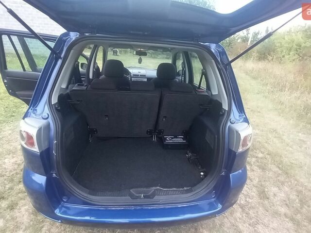 Синій Мазда 2, об'ємом двигуна 1.39 л та пробігом 144 тис. км за 3800 $, фото 8 на Automoto.ua