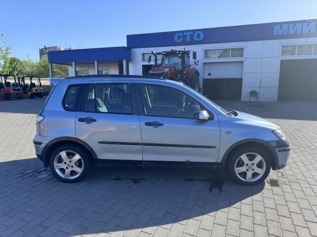 Синий Мазда 2, объемом двигателя 1.4 л и пробегом 135 тыс. км за 1899 $, фото 3 на Automoto.ua