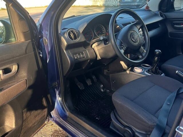 Синий Мазда 2, объемом двигателя 1.39 л и пробегом 207 тыс. км за 3200 $, фото 20 на Automoto.ua