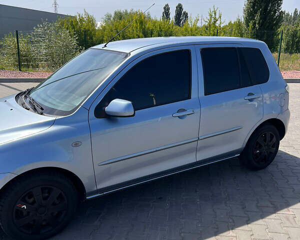 Синий Мазда 2, объемом двигателя 1.4 л и пробегом 179 тыс. км за 3499 $, фото 2 на Automoto.ua