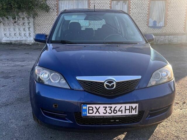 Синий Мазда 2, объемом двигателя 1.39 л и пробегом 207 тыс. км за 3200 $, фото 1 на Automoto.ua