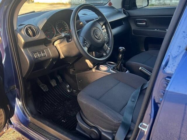 Синий Мазда 2, объемом двигателя 1.39 л и пробегом 207 тыс. км за 3200 $, фото 22 на Automoto.ua