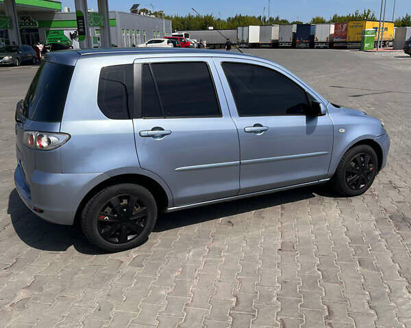 Синий Мазда 2, объемом двигателя 1.4 л и пробегом 179 тыс. км за 3499 $, фото 6 на Automoto.ua