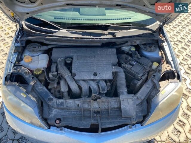 Синий Мазда 2, объемом двигателя 1.39 л и пробегом 272 тыс. км за 4100 $, фото 9 на Automoto.ua