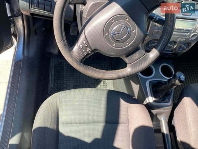 Синий Мазда 2, объемом двигателя 1.39 л и пробегом 272 тыс. км за 4100 $, фото 14 на Automoto.ua