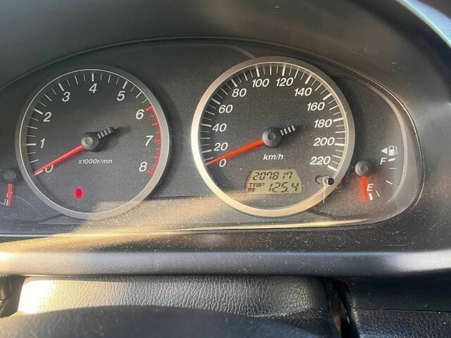 Синий Мазда 2, объемом двигателя 1.39 л и пробегом 207 тыс. км за 3200 $, фото 25 на Automoto.ua