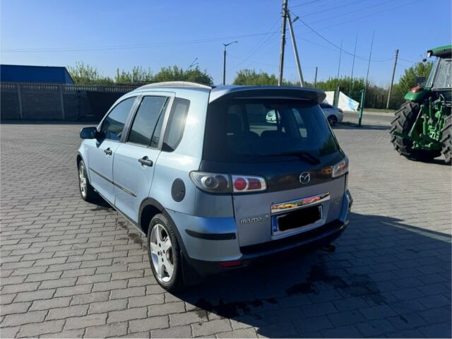 Синий Мазда 2, объемом двигателя 1.4 л и пробегом 135 тыс. км за 1899 $, фото 6 на Automoto.ua