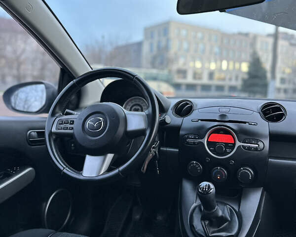 Синій Мазда 2, об'ємом двигуна 1.5 л та пробігом 157 тис. км за 3999 $, фото 14 на Automoto.ua