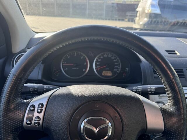 Синий Мазда 2, объемом двигателя 1.4 л и пробегом 135 тыс. км за 1899 $, фото 9 на Automoto.ua