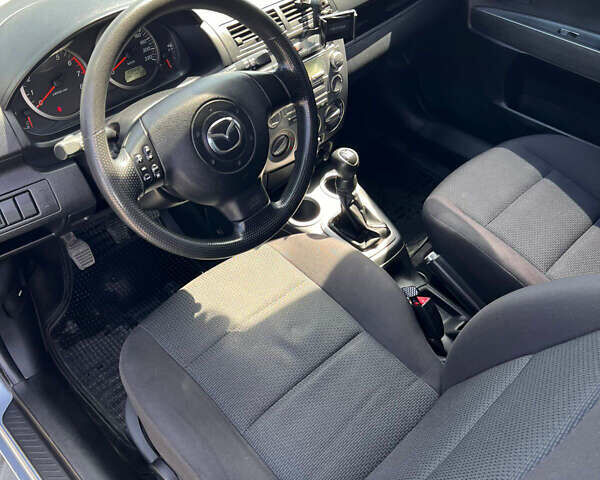 Синий Мазда 2, объемом двигателя 1.4 л и пробегом 179 тыс. км за 3499 $, фото 10 на Automoto.ua