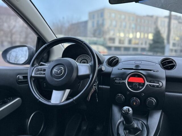 Синій Мазда 2, об'ємом двигуна 1.5 л та пробігом 157 тис. км за 3999 $, фото 14 на Automoto.ua