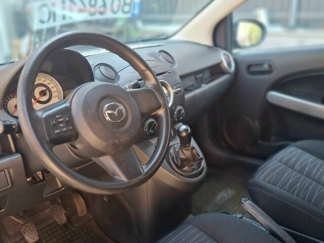 Синій Мазда 2, об'ємом двигуна 1.35 л та пробігом 214 тис. км за 3802 $, фото 11 на Automoto.ua