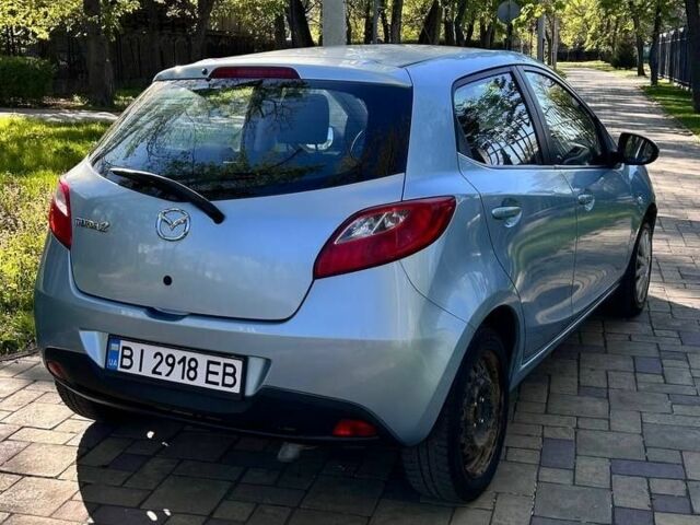 Синій Мазда 2, об'ємом двигуна 1.4 л та пробігом 394 тис. км за 3800 $, фото 2 на Automoto.ua