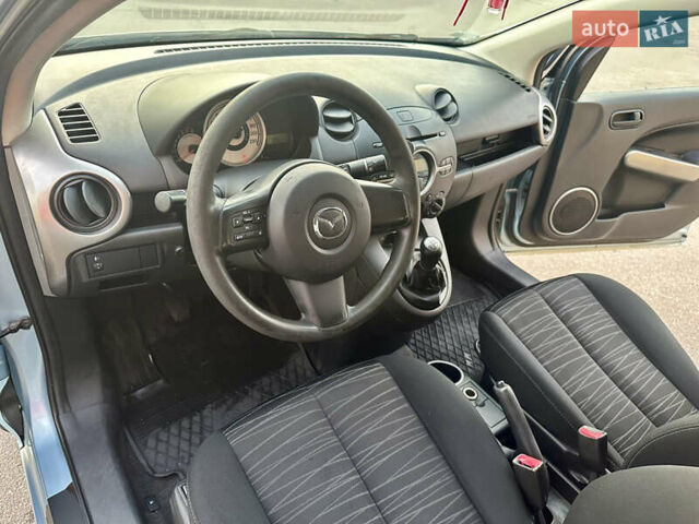 Синий Мазда 2, объемом двигателя 1.3 л и пробегом 182 тыс. км за 4500 $, фото 11 на Automoto.ua