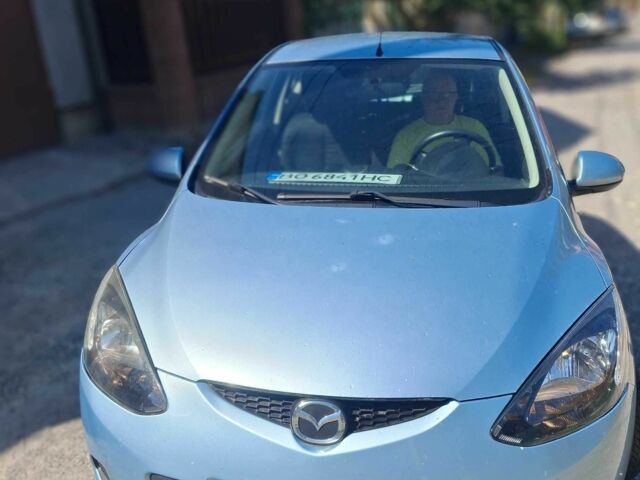 Синій Мазда 2, об'ємом двигуна 1.35 л та пробігом 214 тис. км за 3802 $, фото 6 на Automoto.ua