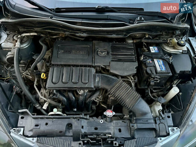 Синий Мазда 2, объемом двигателя 1.3 л и пробегом 182 тыс. км за 4500 $, фото 14 на Automoto.ua