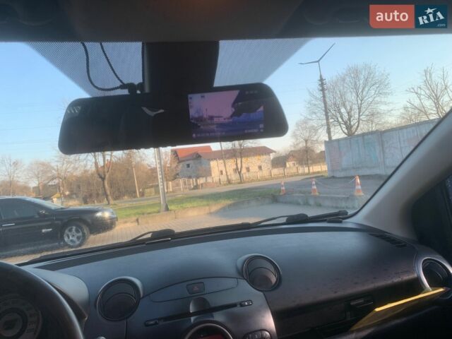 Синий Мазда 2, объемом двигателя 1.3 л и пробегом 198 тыс. км за 5200 $, фото 8 на Automoto.ua
